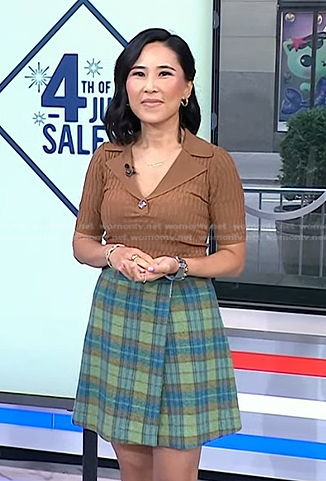 Vicky's brown ribbed polo top and plaid skirt on Today