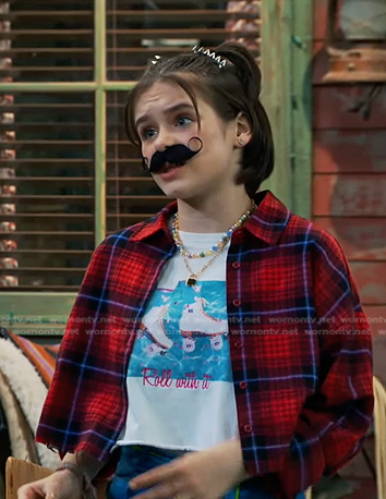 Whinnie's graphic print tee and red plaid cropped shirt on Bunkd
