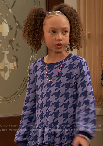 Alice's purple houndstooth sweater on Ravens Home
