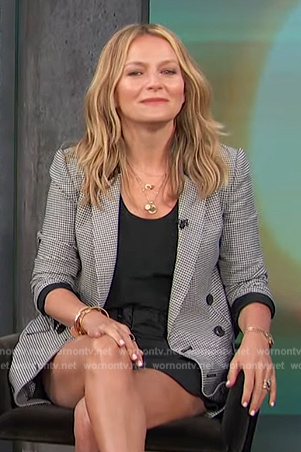 Beckie Newton's houndstooth print blazer on Access Hollywood