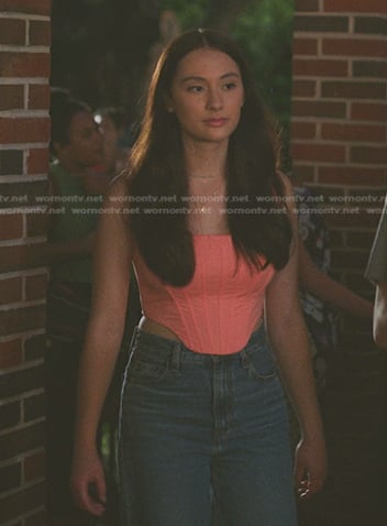Belly's pink corset top and jeans on The Summer I Turned Pretty
