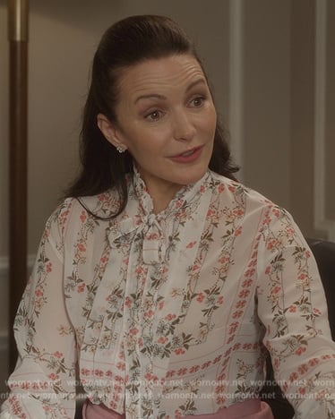 Charlotte's white floral print tie neck blouse on And Just Like That