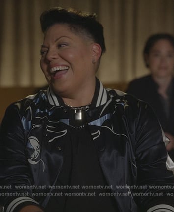 Che's black bomber jacket on And Just Like That