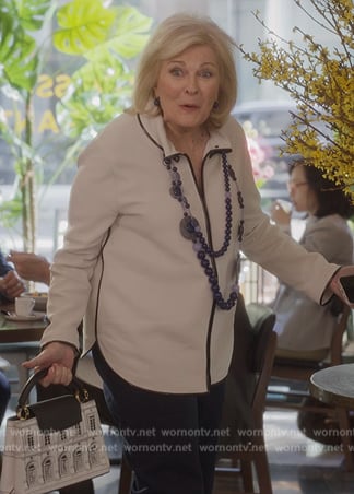Enid's white printed bag on And Just Like That