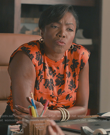 Helen's orange floral print sleeveless top on Sweet Magnolias