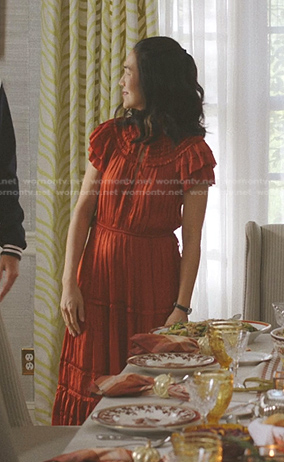 Laurel's orange pleated midi dress on The Summer I Turned Pretty