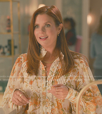 Maddie's white floral print blouse on Sweet Magnolias