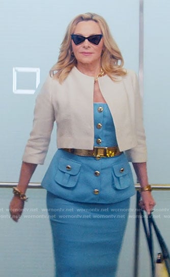 Madolyn's blue button front peplum top and white jacket on Glamorous