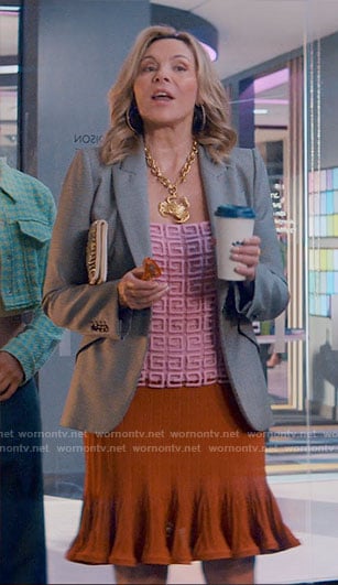 Madolyn's pink monogram top and orange pleated skirt on Glamorous