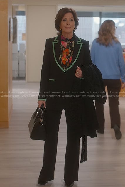 Margaret's black blazer with green trim on So Help Me Todd