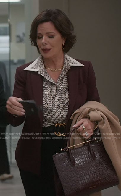 Margaret's geometric print blouse and burgundy blazer on So Help Me Todd