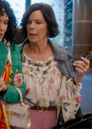 Margaret's white floral ruffled blouse on So Help Me Todd