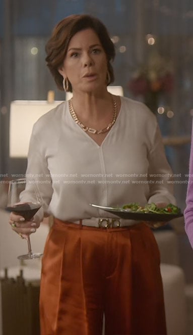 Margaret's white v-neck blouse on So Help Me Todd