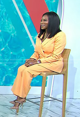 Dr. Michelle Henry's orange suit and pink mules on Today