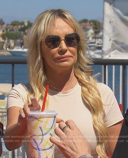 Taylor's beige tee and sunglasses on The Real Housewives of Orange County