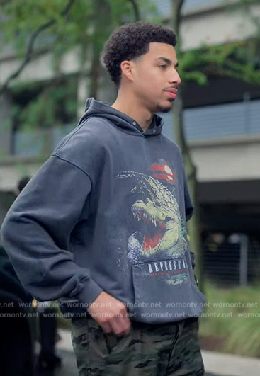 Junior's black crocodile print hoodie on Grown-ish