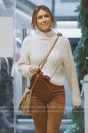 Erin's white mock neck knit sweater on The Real Housewives of New York City