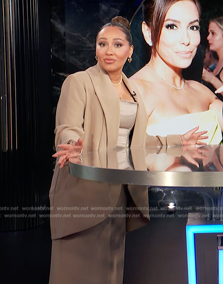 Adrienne's beige blazer on E! News