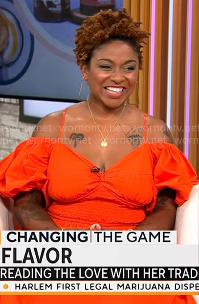 Ashley Rouse's orange off-shoulder puff-sleeve dress on CBS Mornings