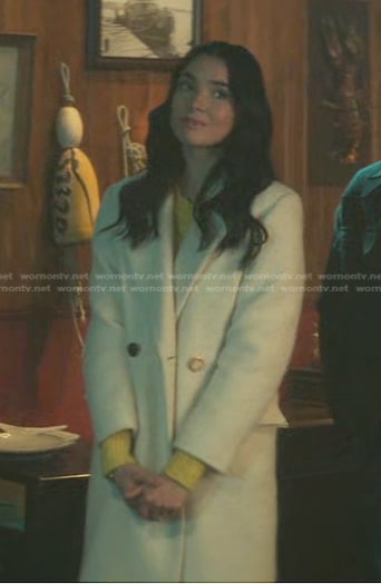 Bess's white long coat on Nancy Drew