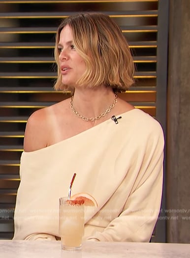 Brooklyn Decker's beige off shoulder knit dress on Access Hollywood