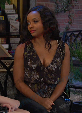 Chanel's black floral peplum top on Days of our Lives