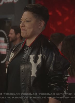 Che's black NY leather bomber jacket on And Just Like That