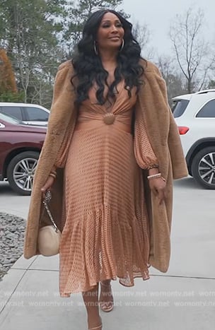 Cynthia's beige side cutouts dress on The Real Housewives of Atlanta