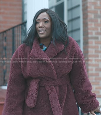 Deja's burgundy wrap teddy coat on The Chi