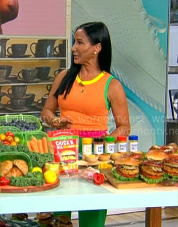 Elizabeth Werner's orange knit top on CBS Mornings