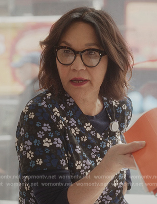Judy's blue floral print top on And Just Like That