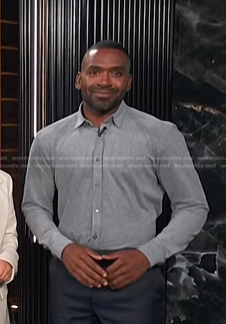 Justin's grey button down shirt on E! News