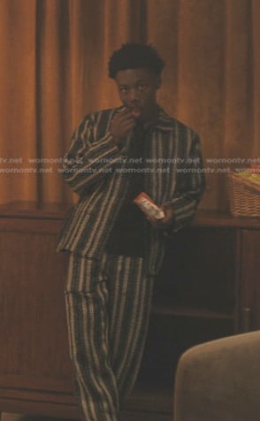 Kevin's black striped jacket and pants on The Chi