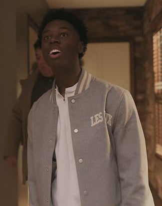Kevin's gray varsity bomber jacket on The Chi