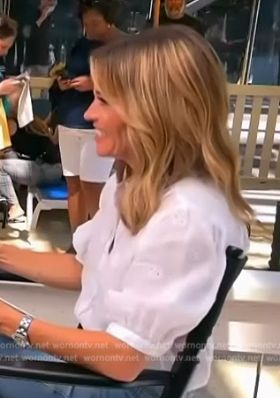 Kit's white embroidered short sleeve top on Access Hollywood