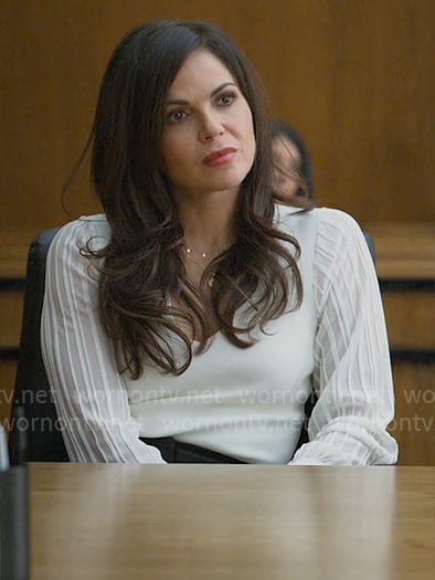 Lisa's white v-neck top with sheer striped sleeves on The Lincoln Lawyer