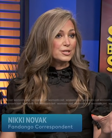 Nikki Novak's black floral applique mini dress on Access Hollywood