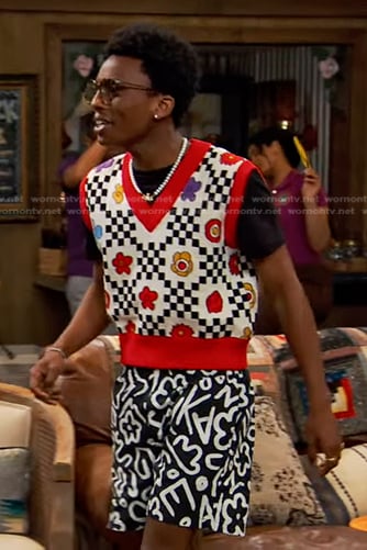 Noah's floral vest and black print shorts on Bunkd