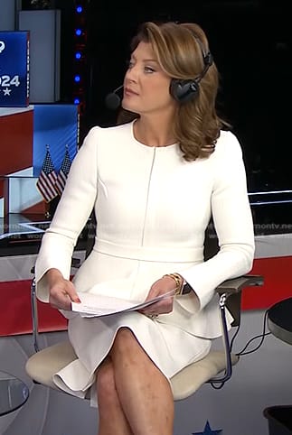Norah's white peplum jacket and skirt on CBS Evening News
