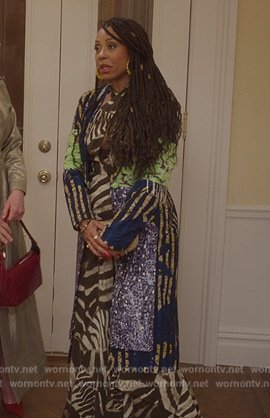 Nya's printed halter neck dress and mixed print coat on And Just Like That
