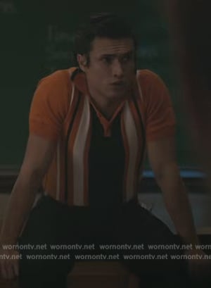 Reggie's orange stripe polo on Riverdale