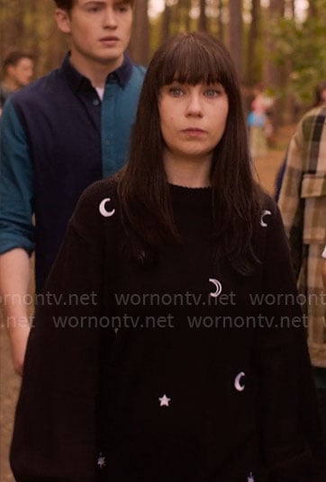 Tori's black star and moon embroidered sweater on Heartstopper