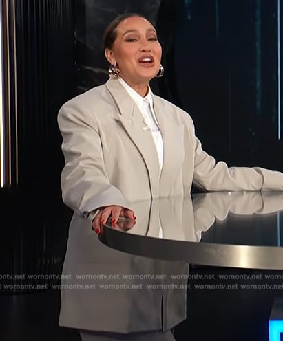 Adrienne's gray blazer and pants on E! News
