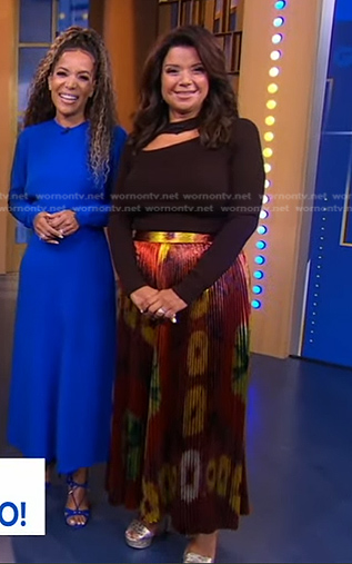 Ana Navarro's brown cutout top and pleated skirt on Good Morning America
