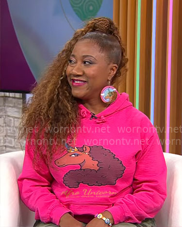 April Showers' pink Afro Unicorn hoodie on CBS Mornings
