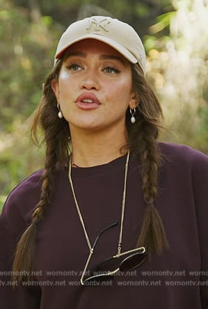 Brynn's pearl drop earrings and cap on The Real Housewives of New York City