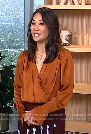 Diane Mizota's orange wrap bodysuit on Access Hollywood