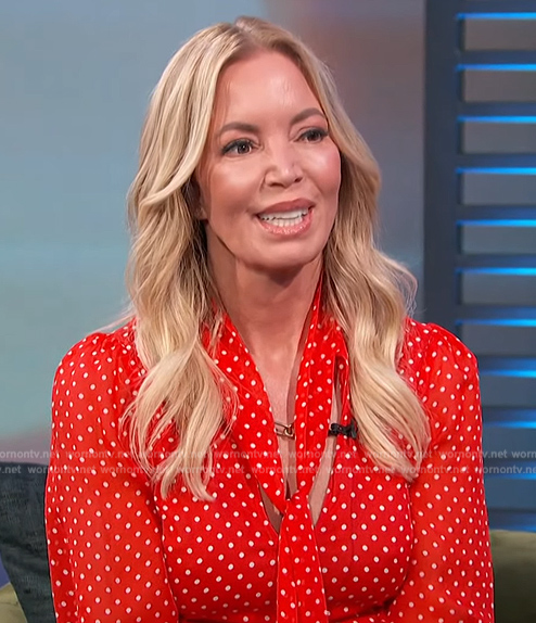 Jeanie Buss's red polka dot blouse on Access Hollywood