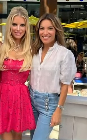 Kit's white blouse and buttoned flare jeans on Access Hollywood