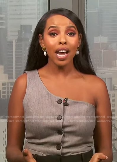Mona's gray one shoulder vest on Extra